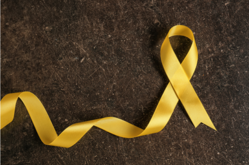 Yellow ribbon representing suicide prevention.